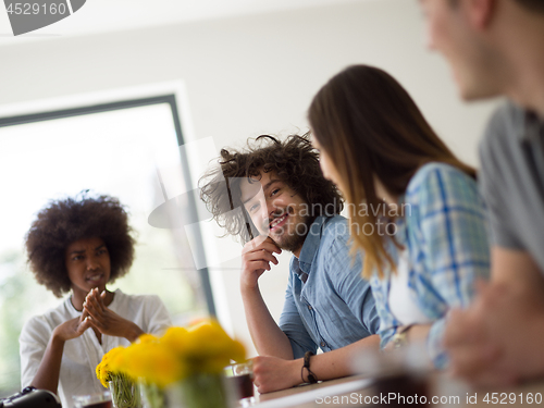 Image of Multiethnic startup Business Team At A Meeting at modern office 