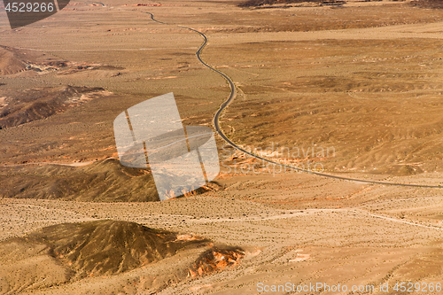 Image of aerial view of road in grand canyon desert