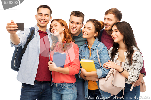 Image of group of students taking selfie by smartphone