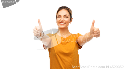 Image of woman or teenage girl in t-shirt showing thumbs up