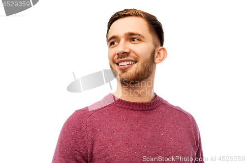 Image of smiling young man over white background