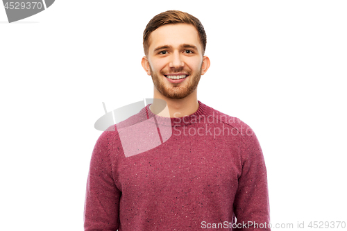Image of smiling young man over white background
