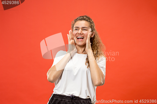 Image of Isolated on pink young casual woman shouting at studio