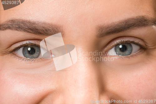 Image of The close up eyes on face of young beautiful caucasian girl