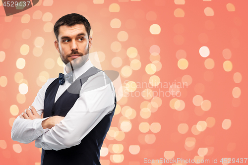 Image of man in party clothes and bowtie