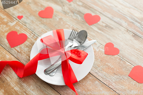 Image of close up of table setting for valentines day