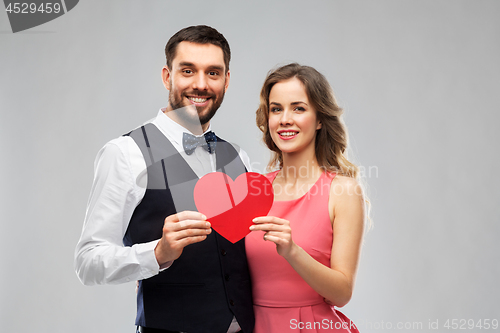 Image of happy couple with red heart on valentines day
