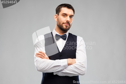 Image of man in party clothes and bowtie