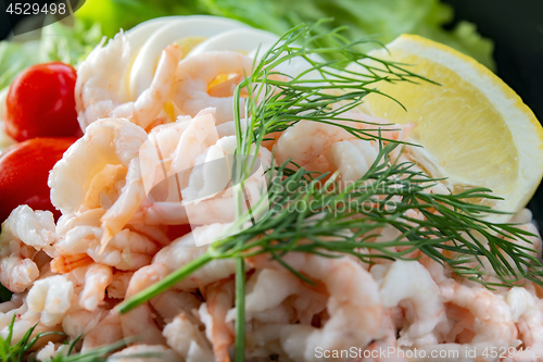 Image of Sandwich filled with prawns and salad