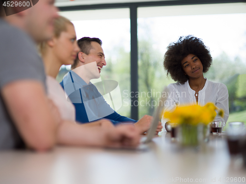 Image of Multiethnic startup Business Team At A Meeting at modern office 