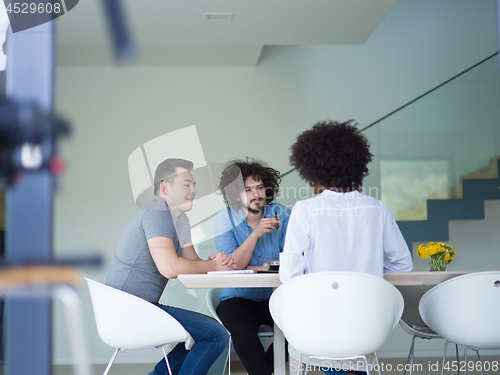 Image of Multiethnic startup Business Team At A Meeting at modern office 