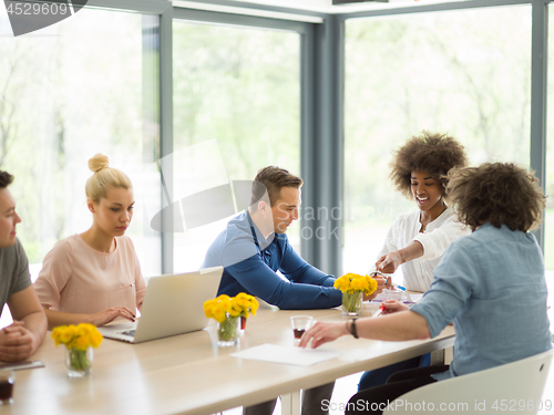 Image of Multiethnic startup Business Team At A Meeting at modern office 