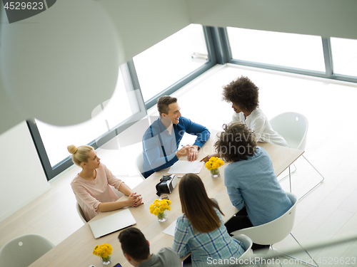 Image of Multiethnic startup Business Team At A Meeting at modern office 