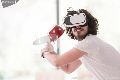 Image of man using VR-headset glasses of virtual reality