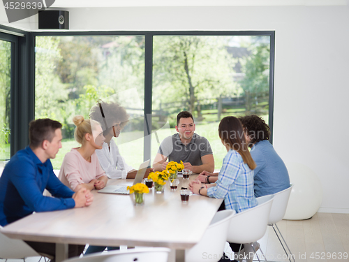 Image of Multiethnic startup Business Team At A Meeting at modern office 