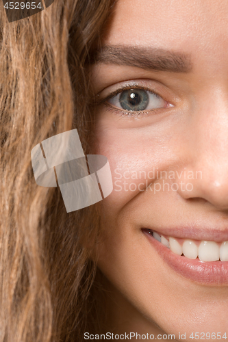 Image of The close up eye on face of young beautiful caucasian girl