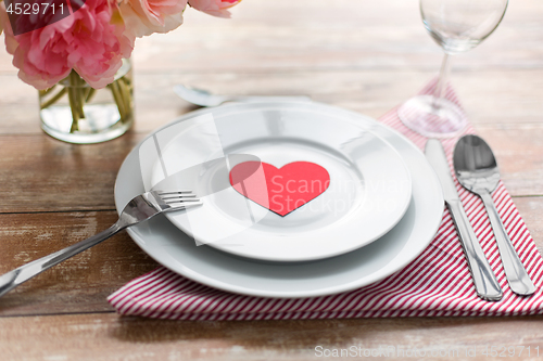 Image of close up of table setting for valentines day