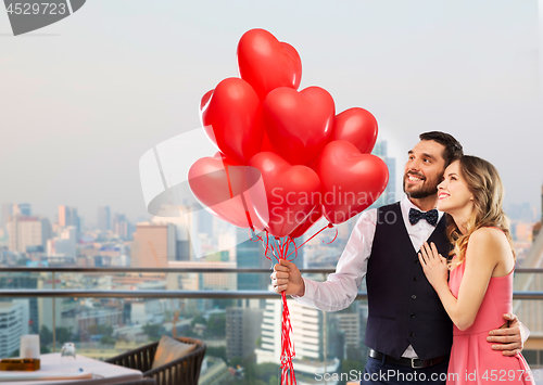 Image of couple with heart shaped balloons in singapore