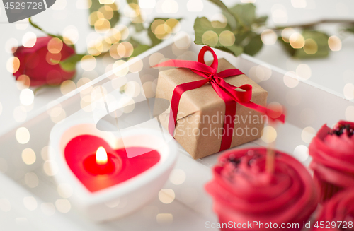 Image of close up of gift box and sweets for valentines day