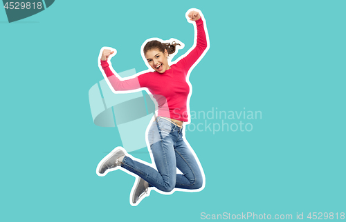 Image of smiling teenage girl jumping in air