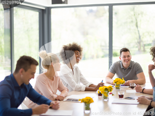 Image of Multiethnic startup Business Team At A Meeting at modern office 