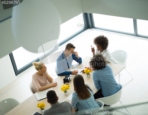 Image of Multiethnic startup Business Team At A Meeting at modern office 