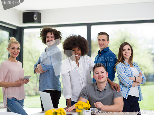 Image of Multiethnic startup Business Team At A Meeting at modern office 