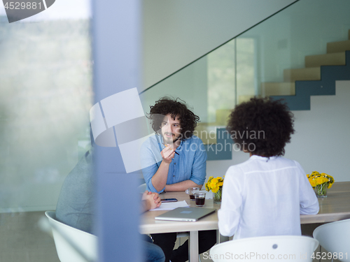 Image of Multiethnic startup Business Team At A Meeting at modern office 