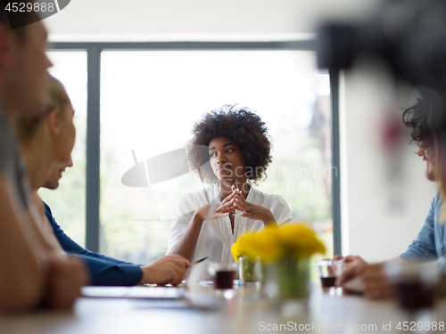 Image of Multiethnic startup Business Team At A Meeting at modern office 