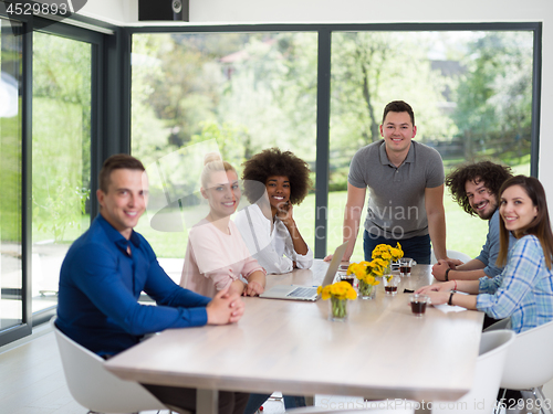 Image of Multiethnic startup Business Team At A Meeting at modern office 