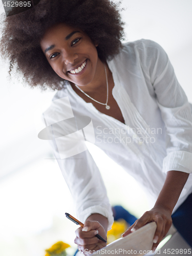 Image of Portrait of black casual business woman