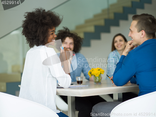 Image of Multiethnic startup Business Team At A Meeting at modern office 