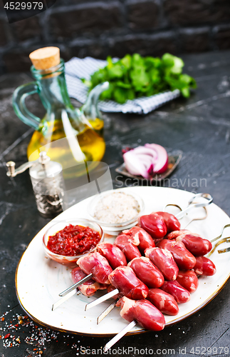 Image of raw chicken hearts