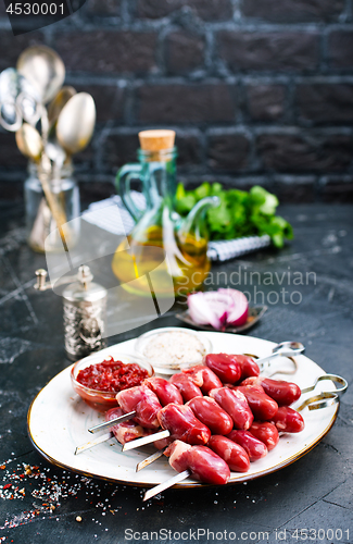 Image of raw chicken hearts