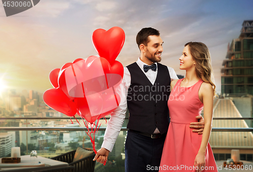 Image of couple with heart shaped balloons in singapore