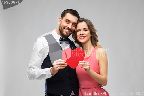 Image of happy couple with red heart on valentines day