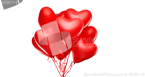 Image of red heart shaped helium balloons on white