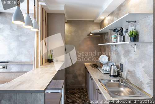 Image of Kitchen interior in a small studio room