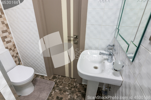 Image of The interior of a small toilet in the hotel room