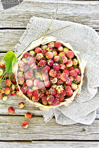 Image of Strawberries in box on board top