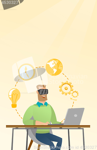 Image of Businessman in vr headset working on a computer.