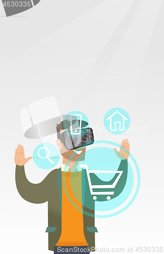 Image of Man in virtual reality headset shopping online.