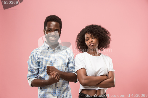 Image of Couple watching sports match on tv at home, celebrating victory, successful game