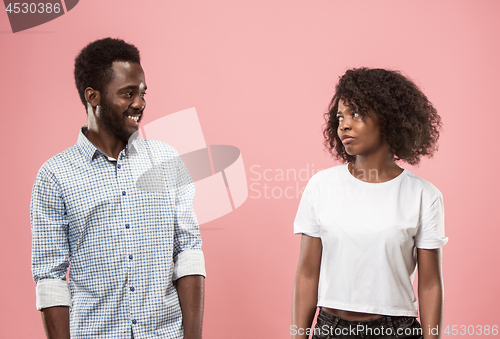 Image of Couple watching sports match on tv at home, celebrating victory, successful game