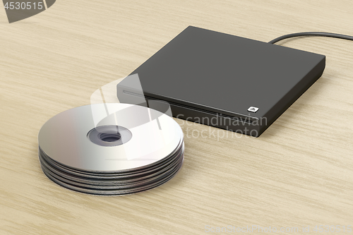 Image of Stack of optical discs and optical drive