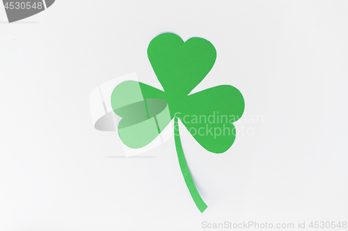 Image of green paper shamrock on white background