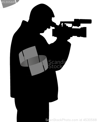 Image of Man with video camera looking through viewfinder