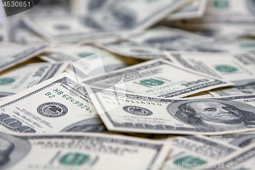 Image of Cash. Banknotes on hundred dollars, close up.