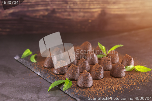 Image of Chocolate truffles powdered with cocoa