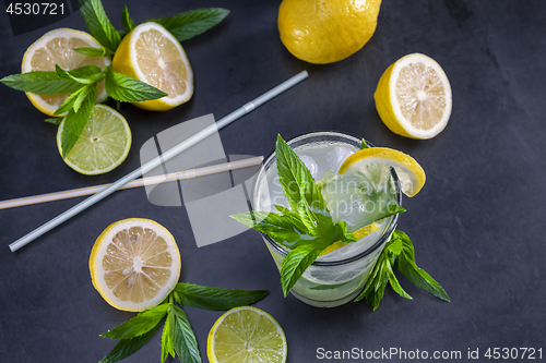 Image of Top view of fresh lemonade with mint in glasses